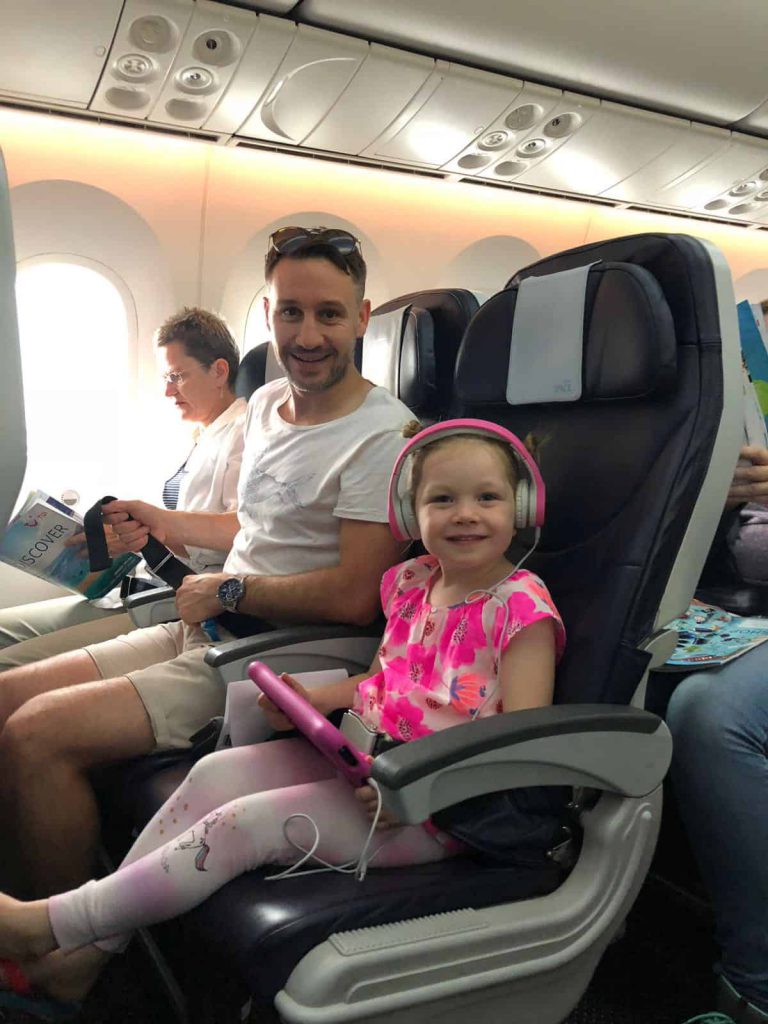 father and daughter on plane