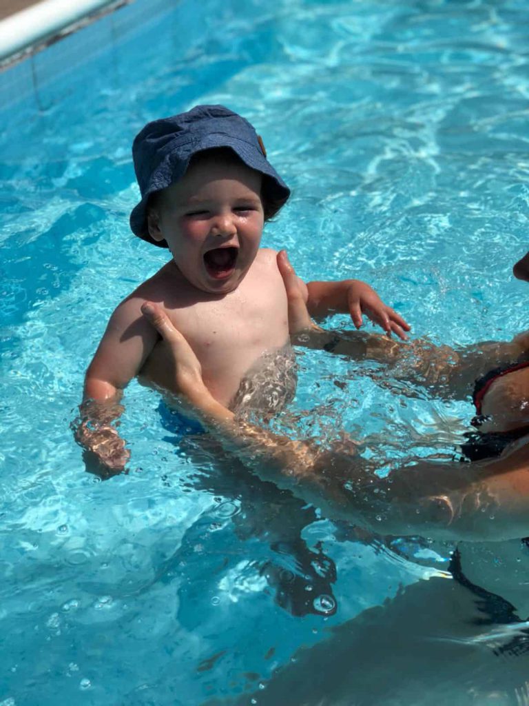 baby boy in swimming pool