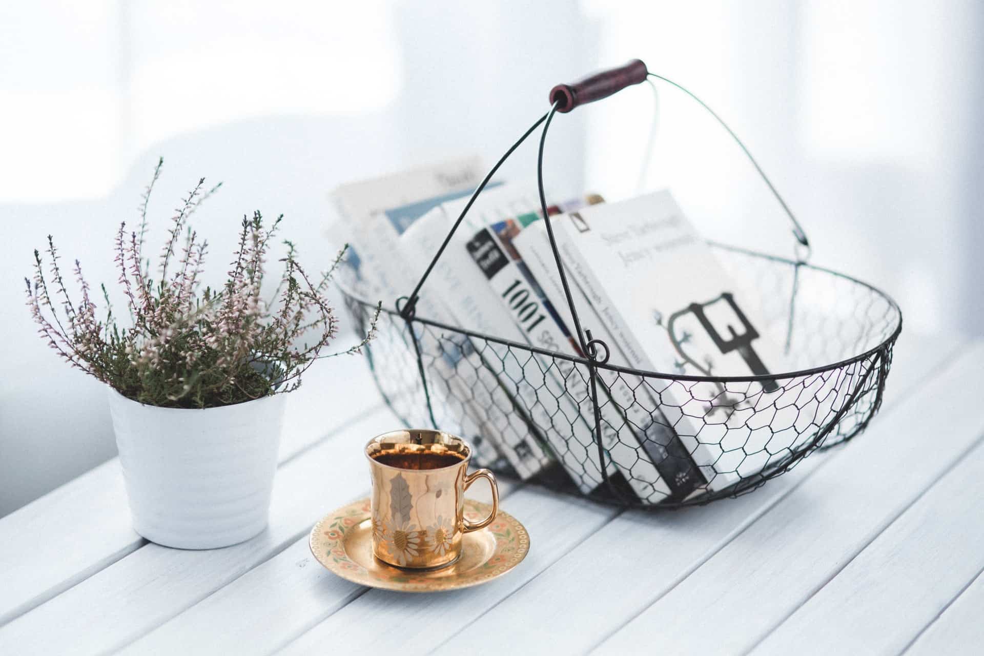 tidier house - wire basket on a white table