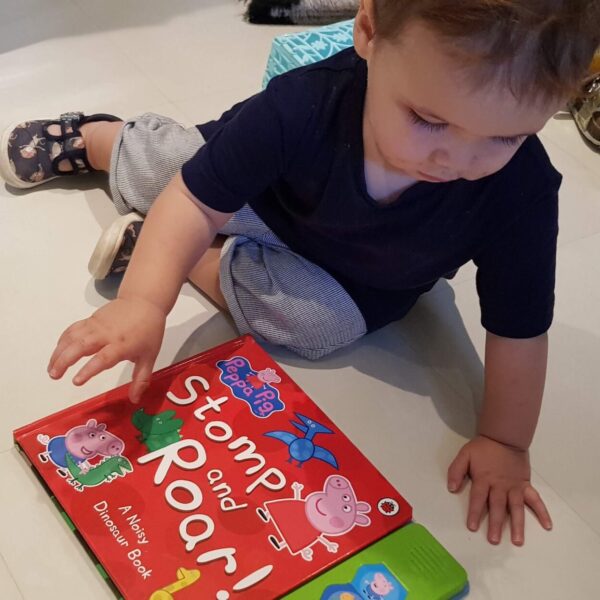 baby reading a book