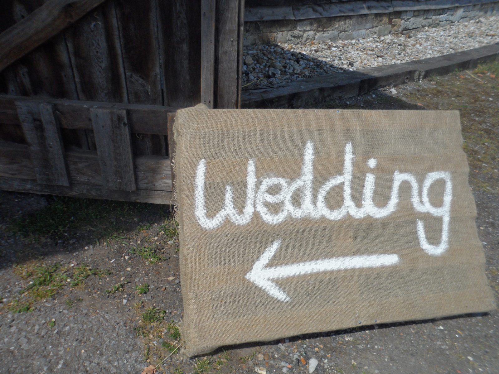 painted sign with the words wedding