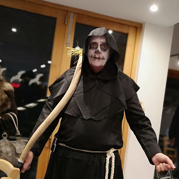 man dressed up as grim reaper