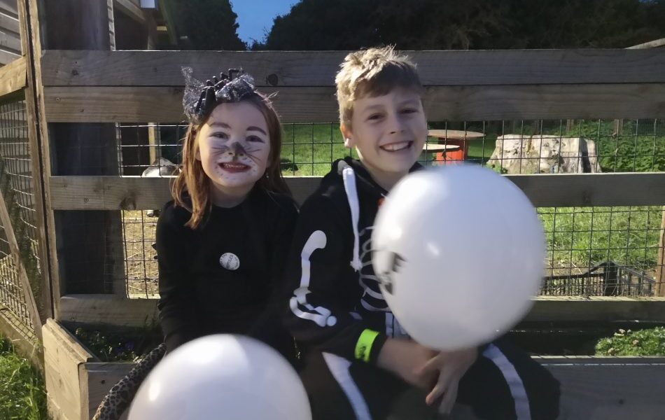 Boy and Girl dressed up for Halloween