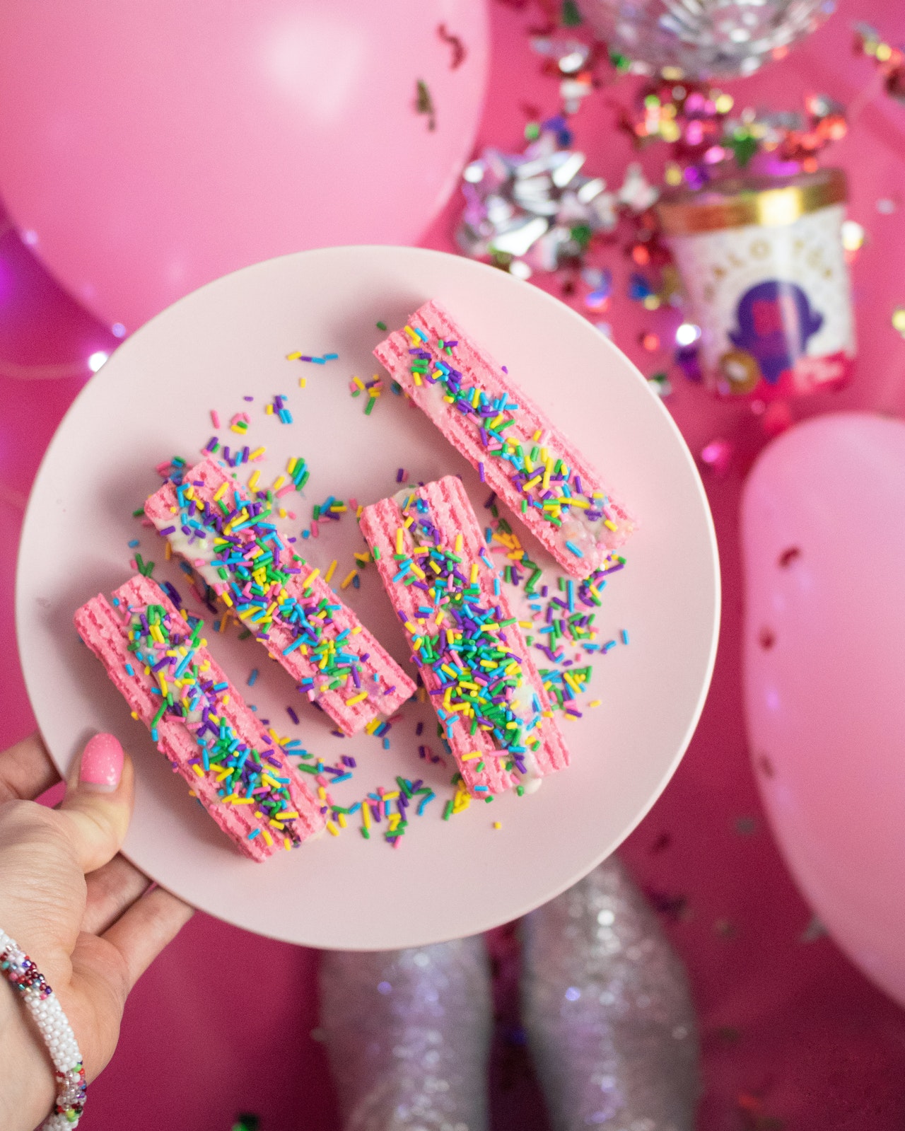 pink cake at a birthday party