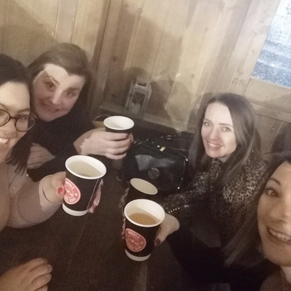 Four girls enjoying drinks