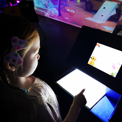 Young girl at computer screen