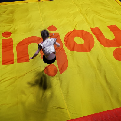 Young girl jumping on air pillow