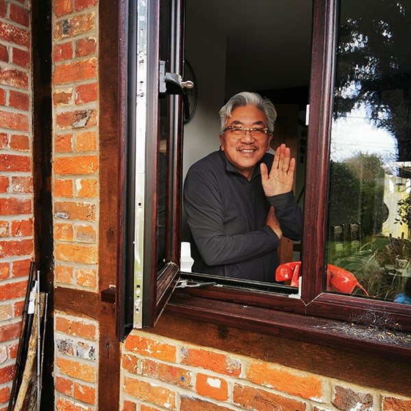 man at window