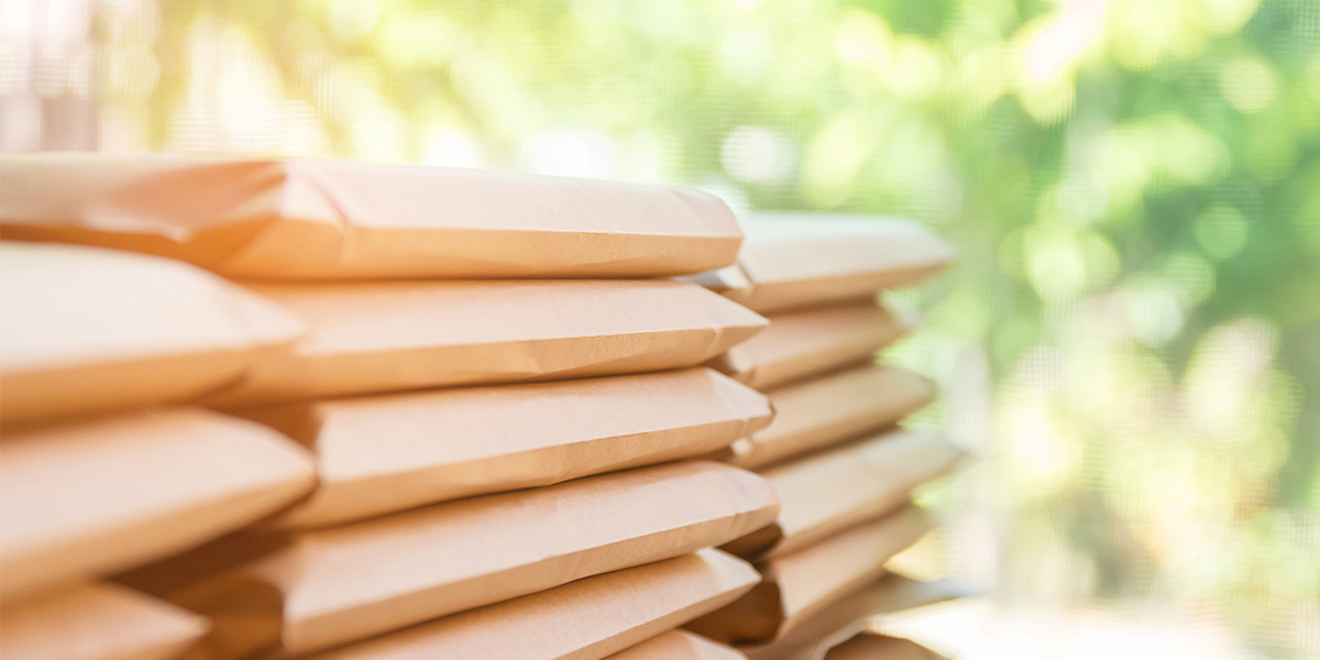 piles of cardboard envelopes