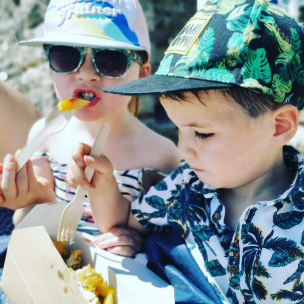 boy and girl eating chips