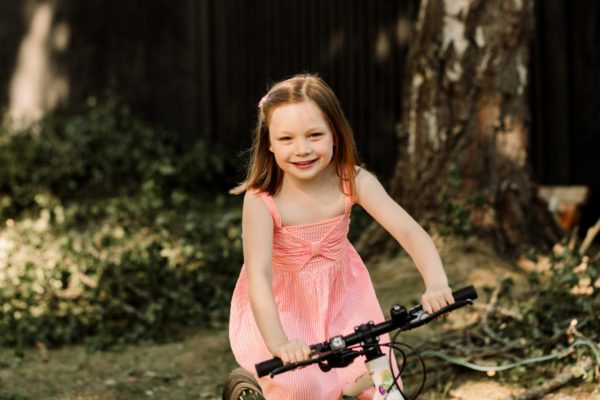 young girl on a bike