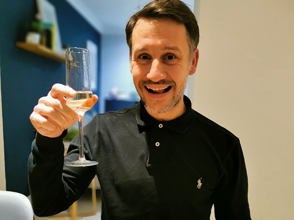 man with champagne glass