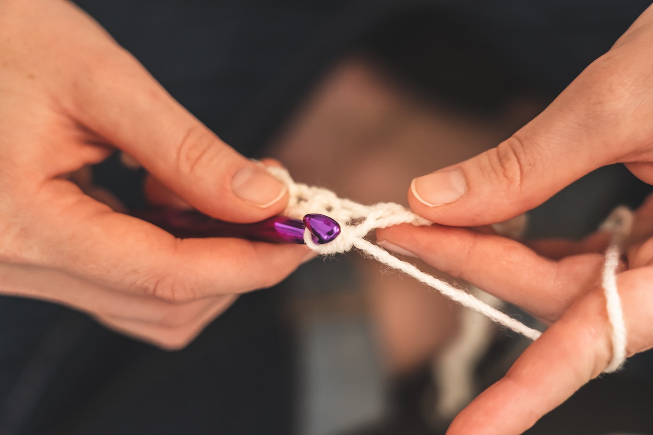 ladies hands crocheting