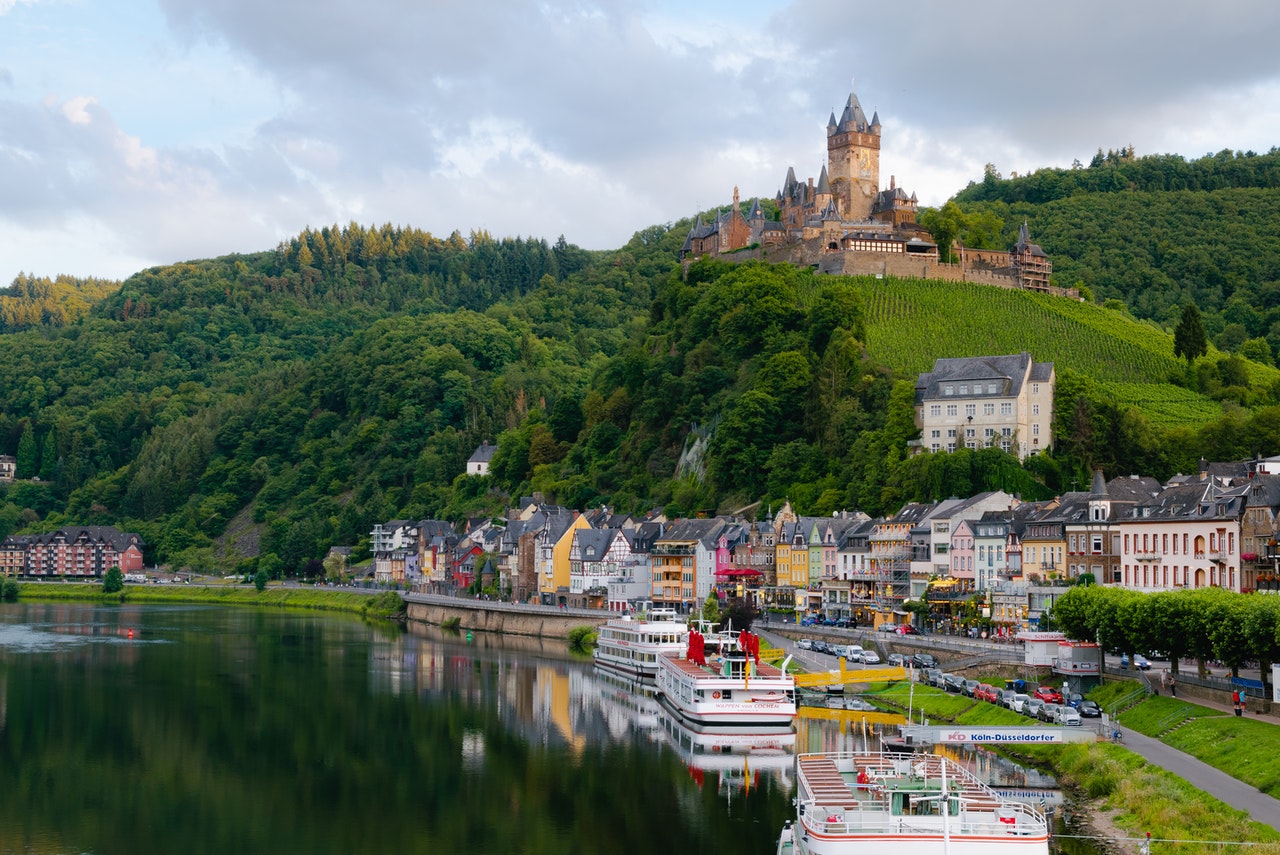 colourful houses by river in europe