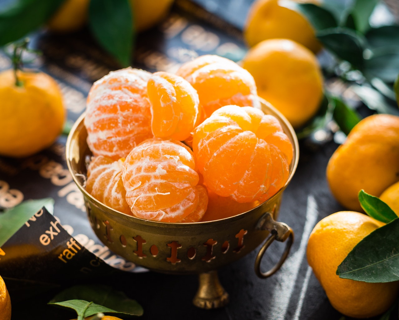 peeled oranges in a bowl